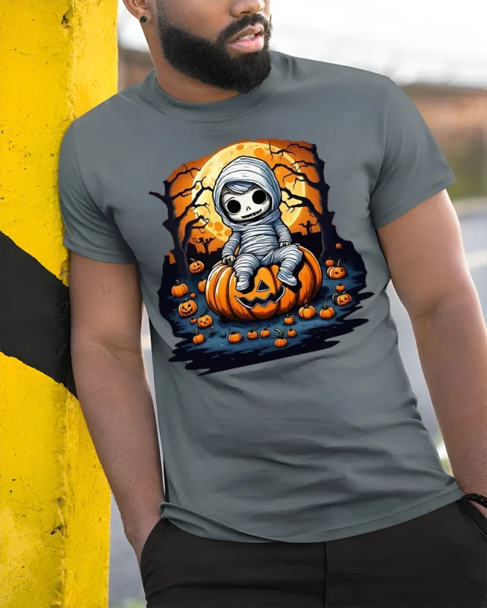 Spooky Cute Mummy Pumpkin Halloween T-shirt - model in grey shirt leaning against column