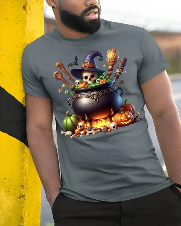 Witch Cauldron Skull Pumpkin Halloween T-shirt - model in grey shirt leaning against column