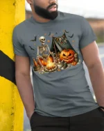 Skeleton Campfire Pumpkin Halloween Tshirt Style - model in grey shirt leaning against column