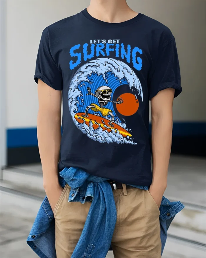 Lets Get Surfing Skeleton Tshirt Retro Wave Graphic - model wearing navy shirt, hands in pockets