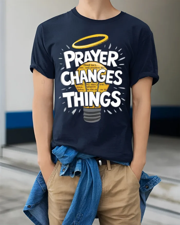 Prayer Changes Things Tshirt Christian Faith Tee - model wearing navy shirt, hands in pockets
