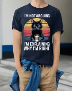 Funny Cat Coffee Tshirt I’m Not Arguing Quote - model wearing navy shirt, hands in pockets