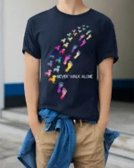 Never Walk Alone Dog Lover Tshirt Colorful Print - model wearing navy shirt, hands in pockets