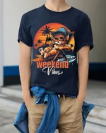 Weekend Vibes Cat Tshirt Retro Chill Sunset Tee - model wearing navy shirt, hands in pockets