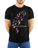 Never Walk Alone Dog Lover Tshirt Colorful Print - model wearing black shirt, hands behind back
