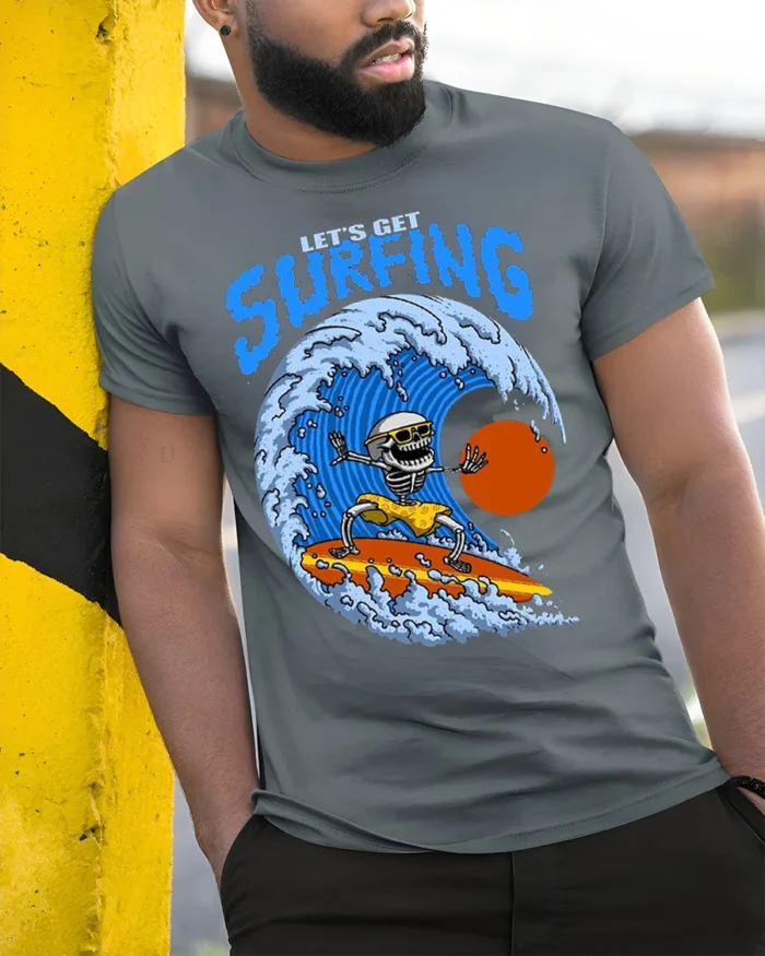 Lets Get Surfing Skeleton Tshirt Retro Wave Graphic - model in grey shirt leaning against column
