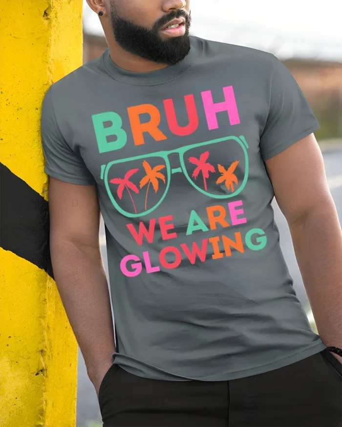 Bruh We Are Glowing Tshirt Neon Party Vibes Tee - model in grey shirt leaning against column