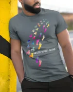 Never Walk Alone Dog Lover Tshirt Colorful Print - model in grey shirt leaning against column