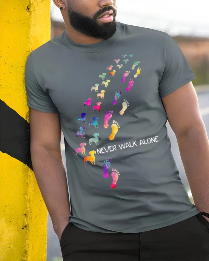 Never Walk Alone Dog Lover Tshirt Colorful Print - model in grey shirt leaning against column