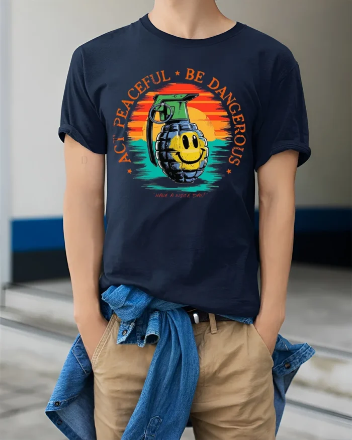 Act Peaceful Be Dangerous Graphic T-Shirt Tee - model wearing navy shirt, hands in pockets