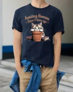 Avoiding Humans Funny Cat Graphic T-Shirt Tee - model wearing navy shirt, hands in pockets