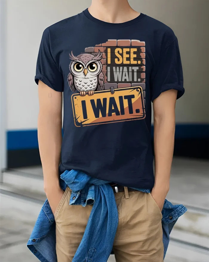 I See I Wait Owl Graphic Funny Quote T-Shirt - model wearing navy shirt, hands in pockets