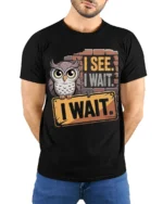 I See I Wait Owl Graphic Funny Quote T-Shirt - model wearing black shirt, hands behind back