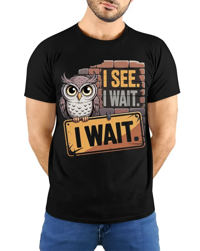 I See I Wait Owl Graphic Funny Quote T-Shirt - model wearing black shirt, hands behind back