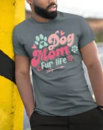 Dog Mom Fur Life Graphic T-Shirt for Pet Lovers - model in grey shirt leaning against column
