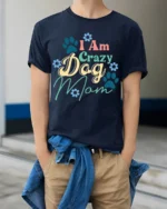 Funny Crazy Dog Mom Paw Print Graphic T-Shirt - model wearing navy shirt, hands in pockets