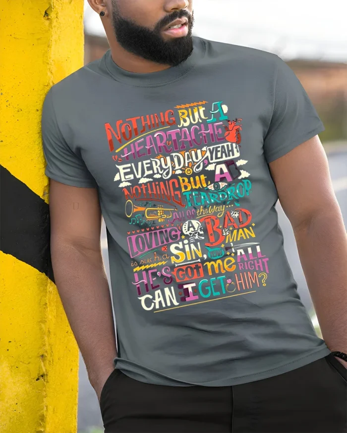 Colorful Retro Typography Graphic Quote T-Shirt - model in grey shirt leaning against column