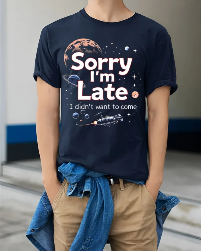 Funny Sorry I’m Late Space Galaxy Graphic T-Shirt - model wearing navy shirt, hands in pockets
