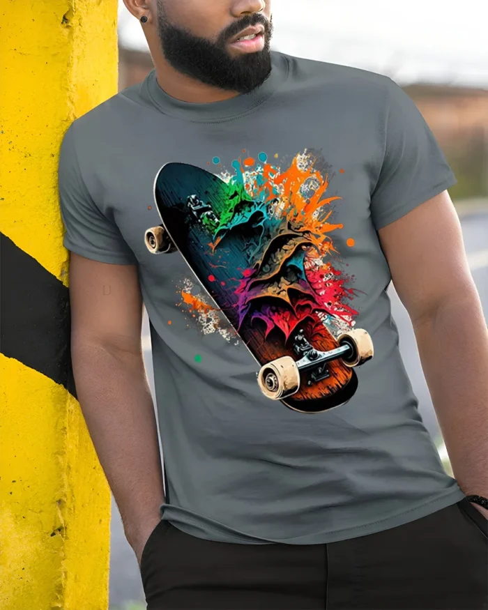 Colorful Skateboard Splash Art Graphic T-Shirt - model in grey shirt leaning against column