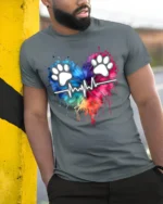 Colorful Paw Heartbeat Pet Lover Graphic T-Shirt - model in grey shirt leaning against column