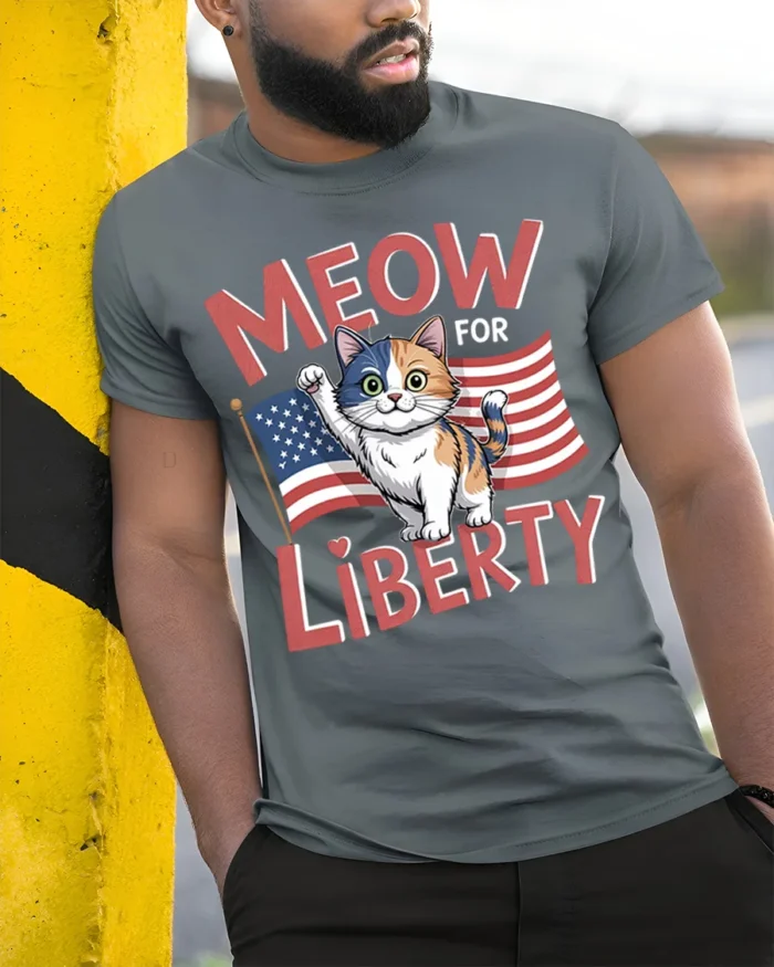 Meow For Liberty Patriotic Cat Graphic T-Shirt - model in grey shirt leaning against column