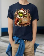Funny Grinch Merry Christmas Holiday T-Shirt - model wearing navy shirt, hands in pockets