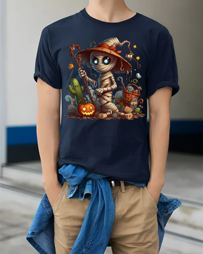 Cute Mummy Witch Halloween Pumpkin Graphic T-Shirt - model wearing navy shirt, hands in pockets