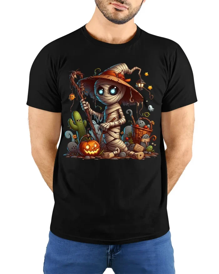 Cute Mummy Witch Halloween Pumpkin Graphic T-Shirt - model wearing black shirt, hands behind back