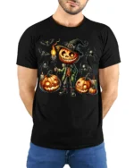 Pumpkin Head Halloween Witch Scarecrow T-Shirt - model wearing black shirt, hands behind back