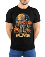 Scary Doll Mask Pumpkin Halloween Graphic T-Shirt - model wearing black shirt, hands behind back