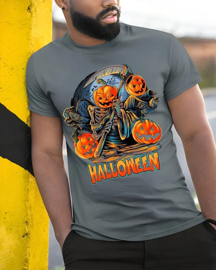 Pumpkin Reaper Halloween Scythe Graphic T-Shirt - model in grey shirt leaning against column