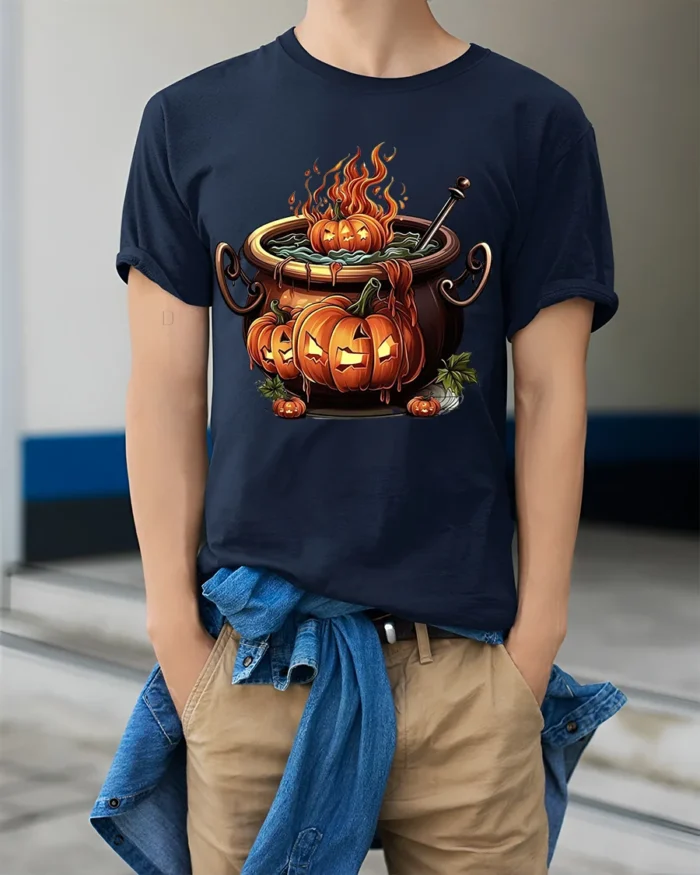 Halloween Pumpkin Cauldron Fire Potion T-Shirt - model wearing navy shirt, hands in pockets