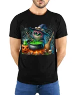 Halloween Witch Owl Cauldron Magic T-Shirt - model wearing black shirt, hands behind back