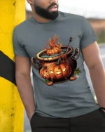 Halloween Pumpkin Cauldron Fire Potion T-Shirt - model in grey shirt leaning against column