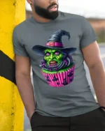Creepy Witch Cupcake Halloween Graphic T-Shirt - model in grey shirt leaning against column