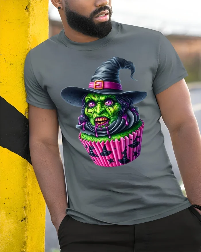 Creepy Witch Cupcake Halloween Graphic T-Shirt - model in grey shirt leaning against column