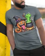 Funny Pumpkin Witch Cauldron Halloween T-Shirt - model in grey shirt leaning against column