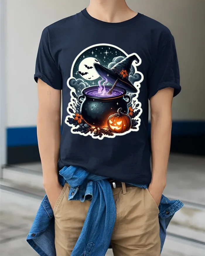 Witch Cauldron Pumpkin Moon Halloween Graphic T-Shirt - model wearing navy shirt, hands in pockets