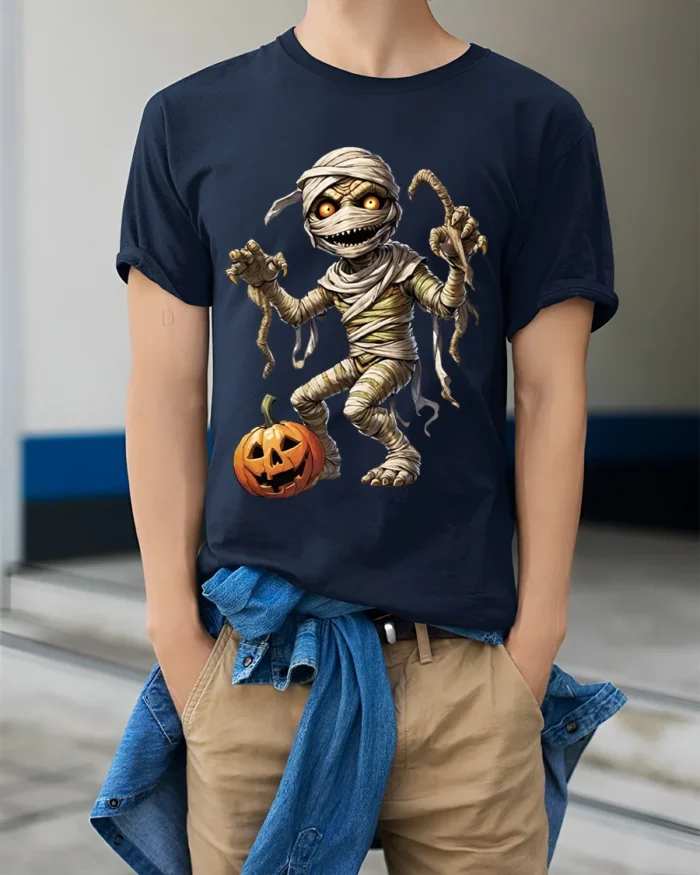Creepy Mummy Pumpkin Halloween Night Graphic T-Shirt - model wearing navy shirt, hands in pockets