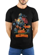 Flying Witch Broomstick Pumpkin Halloween Graphic T-Shirt - model wearing black shirt, hands behind back