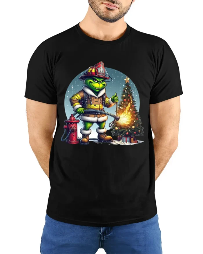 Funny Firefighter Grinch Christmas Tree Graphic T-Shirt - model wearing black shirt, hands behind back