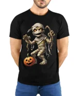 Creepy Mummy Pumpkin Halloween Night Graphic T-Shirt - model wearing black shirt, hands behind back