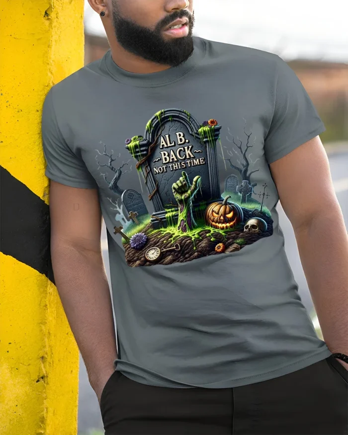 Zombie Grave Tombstone Pumpkin Halloween T-Shirt - model in grey shirt leaning against column
