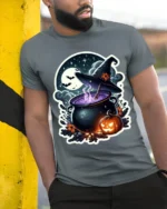 Witch Cauldron Pumpkin Moon Halloween Graphic T-Shirt - model in grey shirt leaning against column