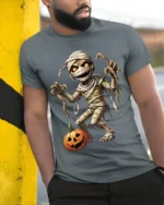 Creepy Mummy Pumpkin Halloween Night Graphic T-Shirt - model in grey shirt leaning against column