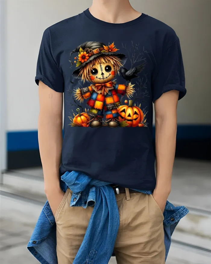 Colorful Patchwork Scarecrow Halloween Graphic Tshirt - model wearing navy shirt, hands in pockets