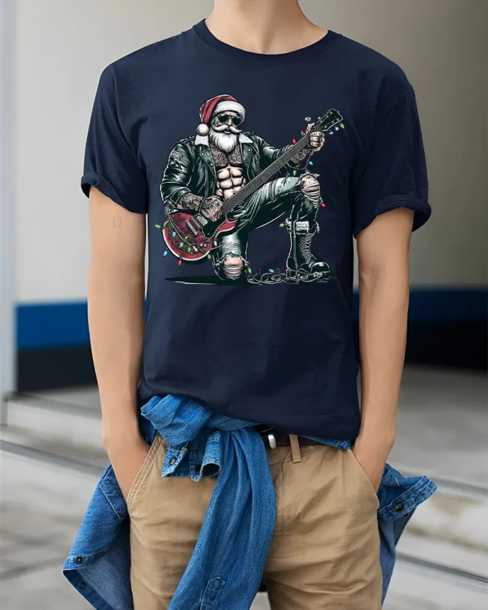 Rockstar Santa Guitar Christmas Holiday Graphic Tshirt - model wearing navy shirt, hands in pockets