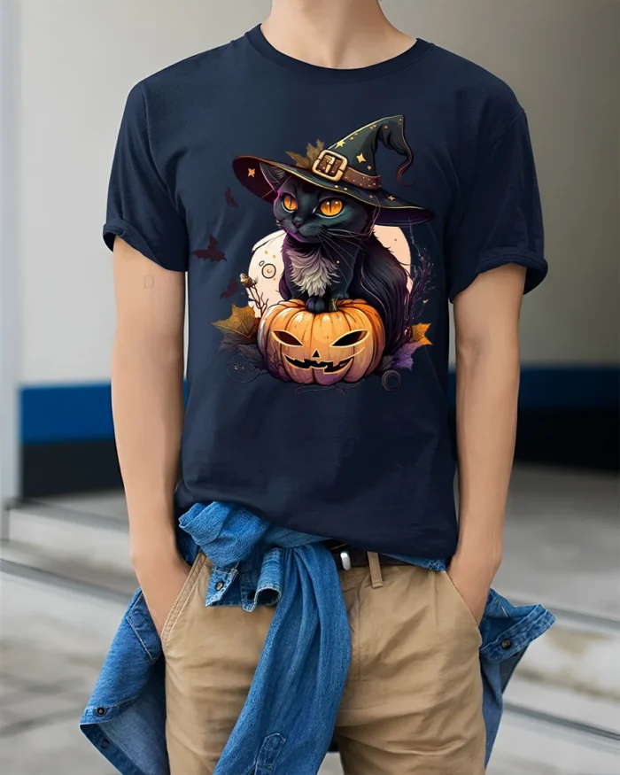 Black Cat Witch Pumpkin Halloween Graphic Tshirt - model wearing navy shirt, hands in pockets
