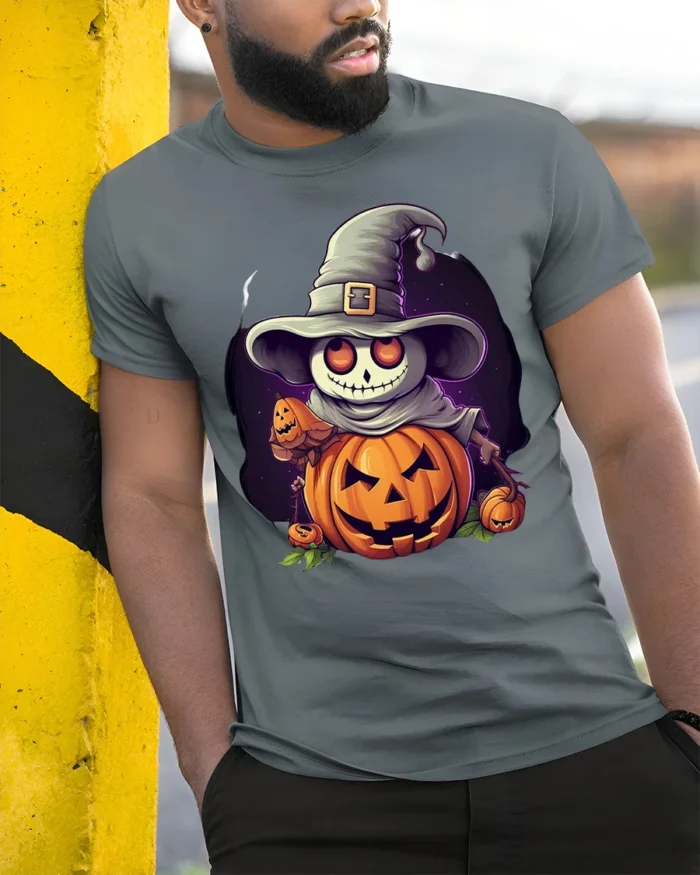 Smiling Pumpkin Skeleton Witch Halloween Graphic Tshirt - model in grey shirt leaning against column