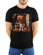 Pumpkin Mummy Halloween Lantern Graphic T-Shirt - model wearing black shirt, hands behind back